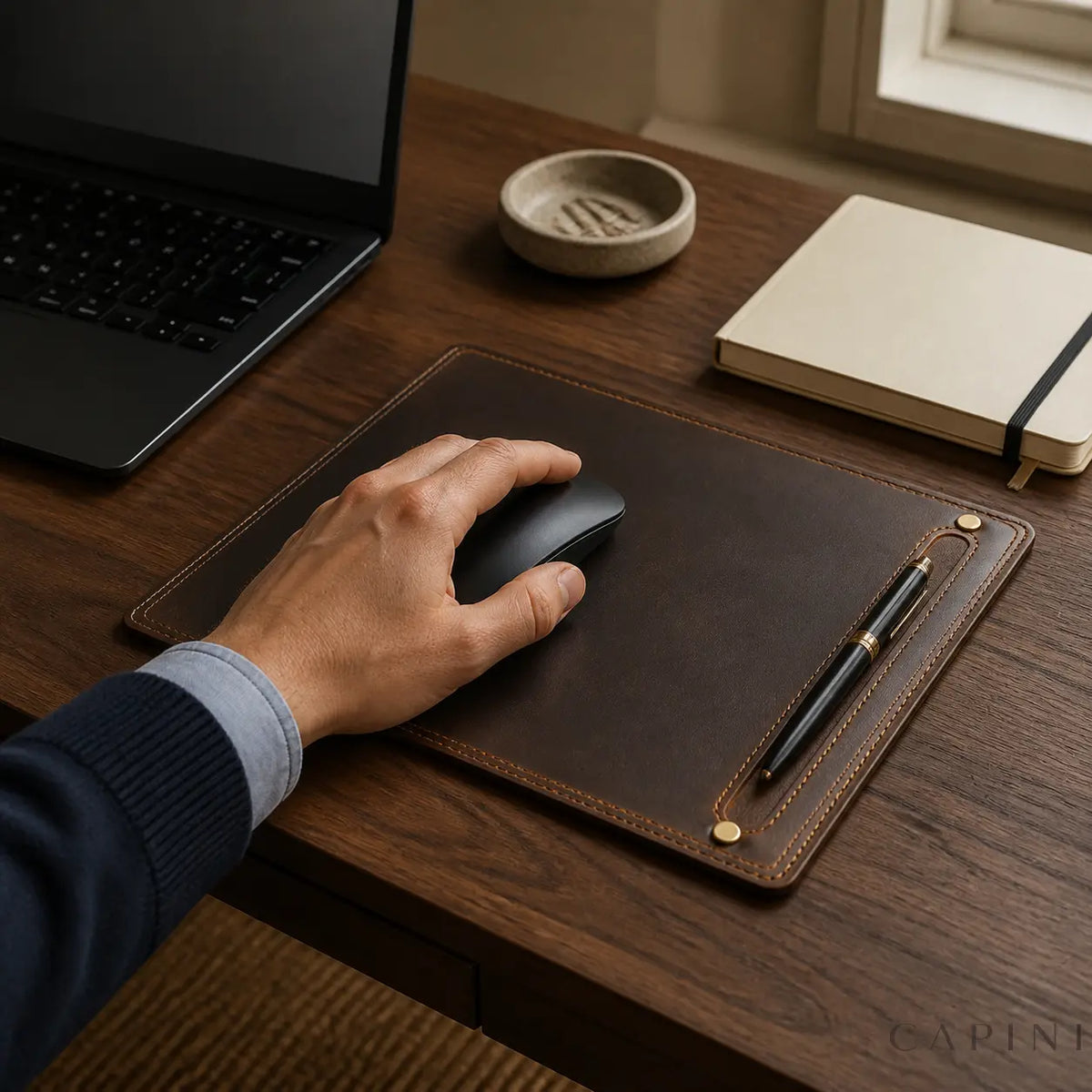 Leather mouse pad in a premium walnut home-office setting