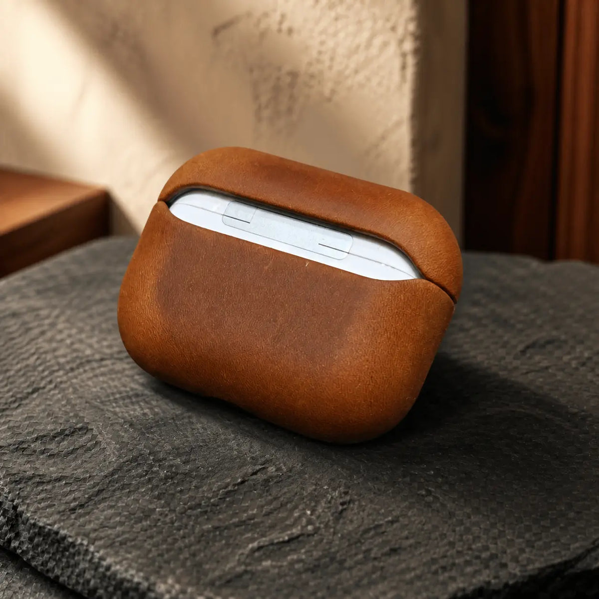 Orvieto Cocoa leather AirPods case fit detail