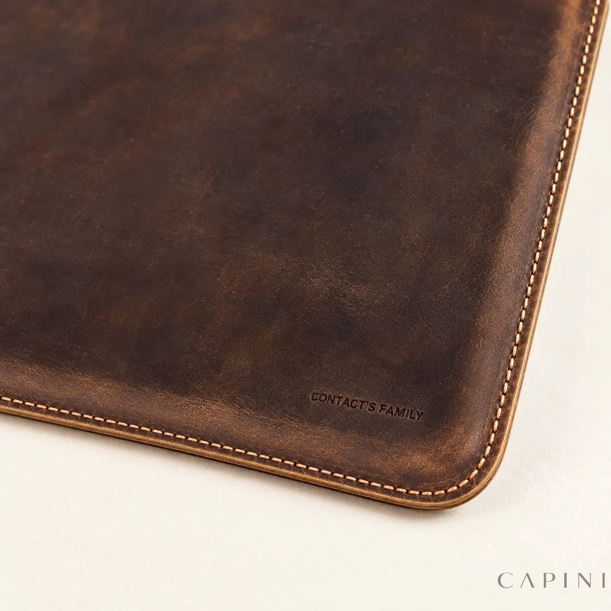 Cortona Landscape sleeve - brown leather, stitched corner and embossed mark