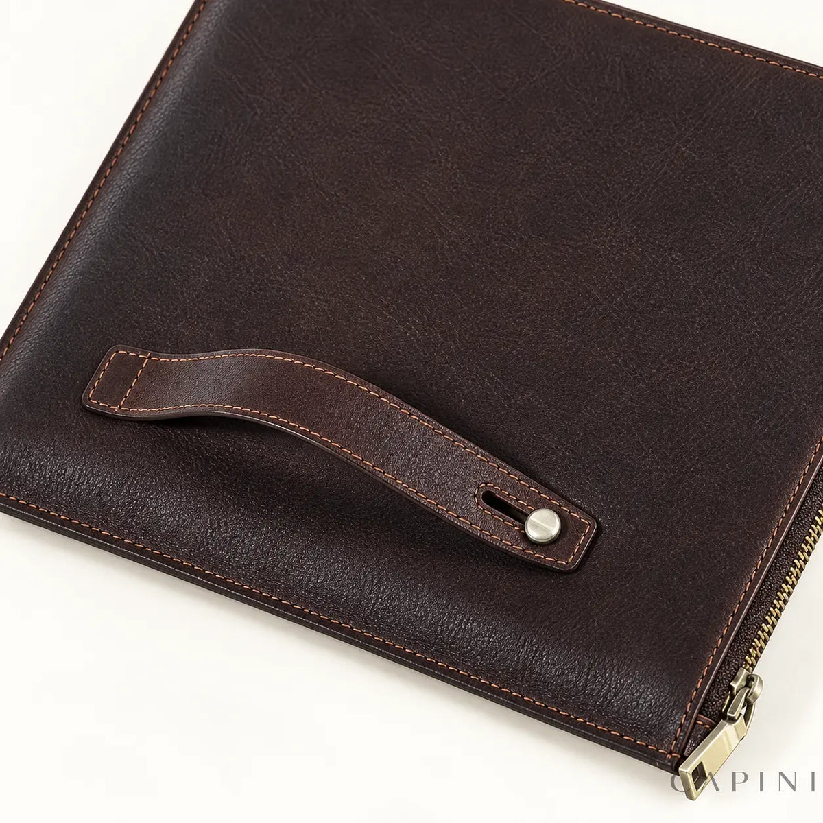 Tolentino espresso leather folio - hand strap, stitching and stud detail
