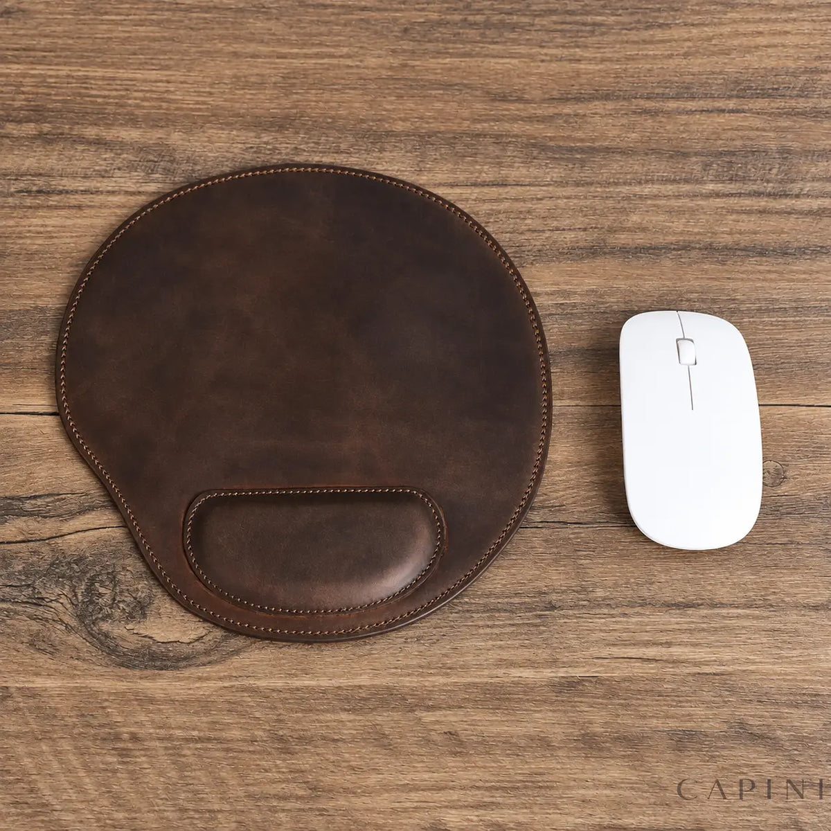 Urbino brown leather mouse pad with mouse beside it
