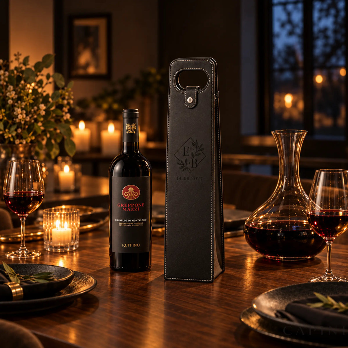 Conegliano Black engraved wine carrier beside Greppone Mazzi wine at dinner