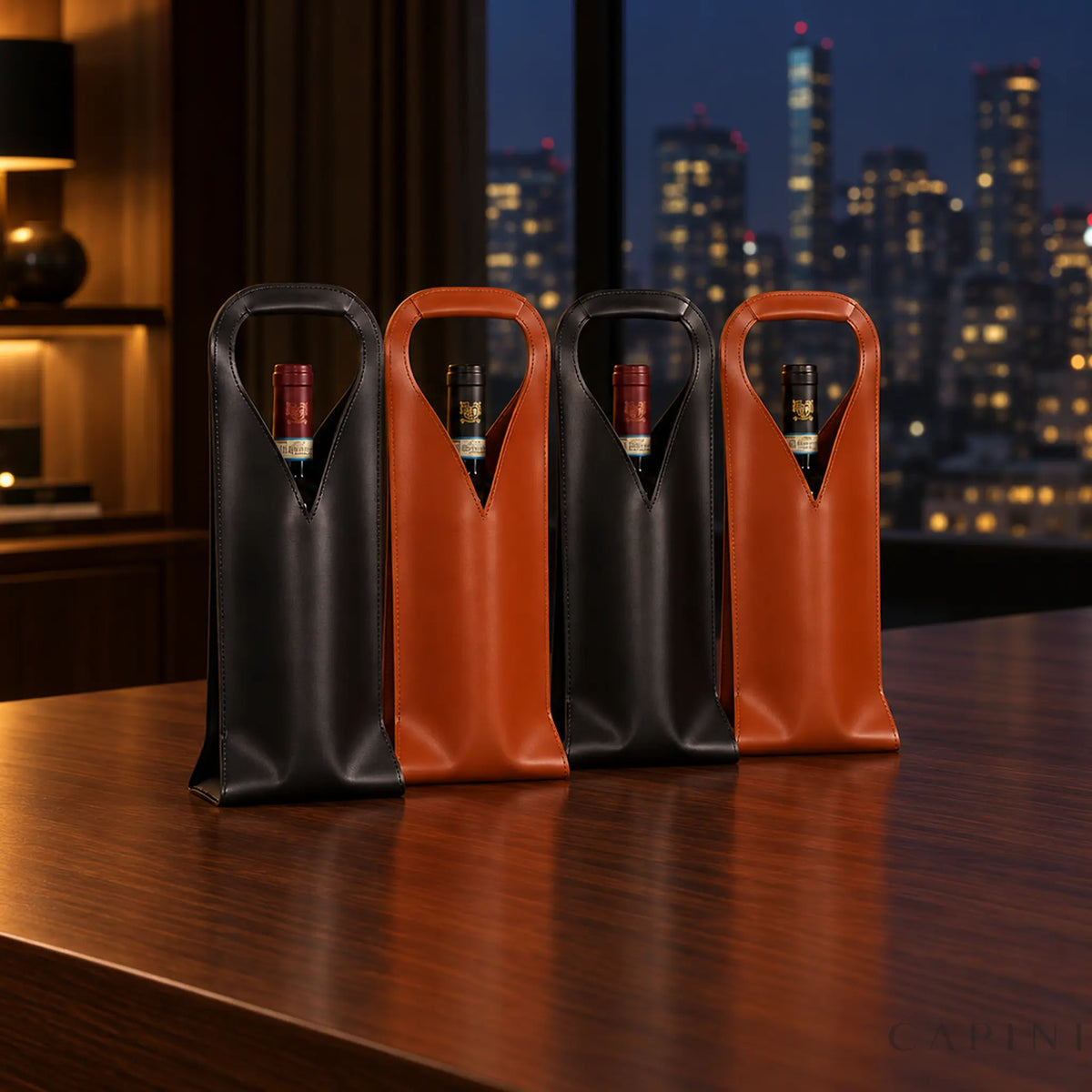 Four Cormons Loop Handle wine carriers in Black and Cognac in an evening office