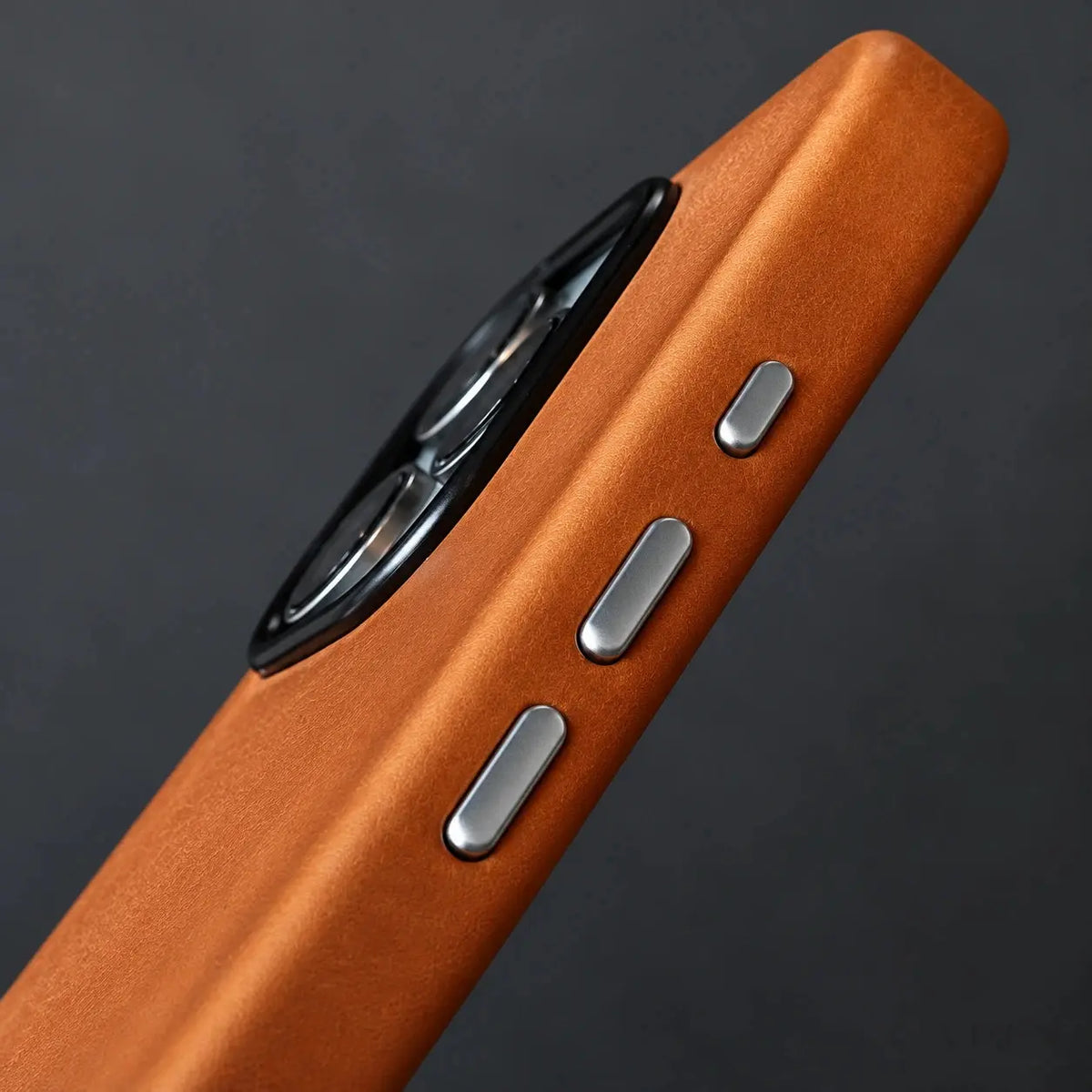 Copenhagen leather case side buttons and camera rim detail
