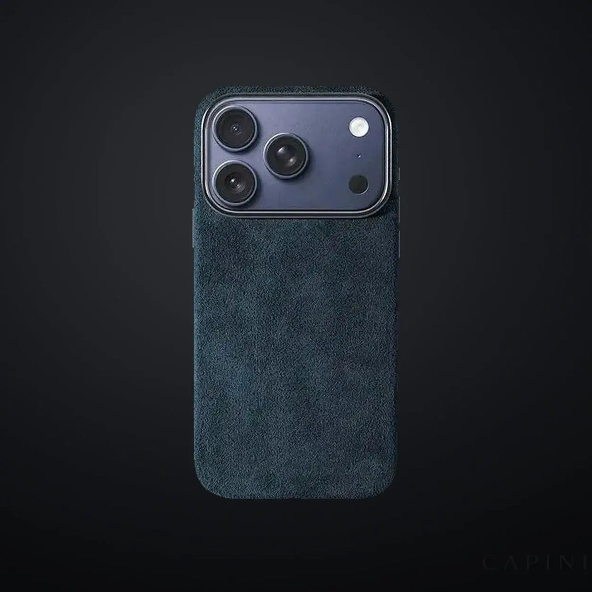 Monaco GT Blue Alcantara iPhone case on a charcoal gradient | CAPINI_GRID_EDITORIAL_20260926