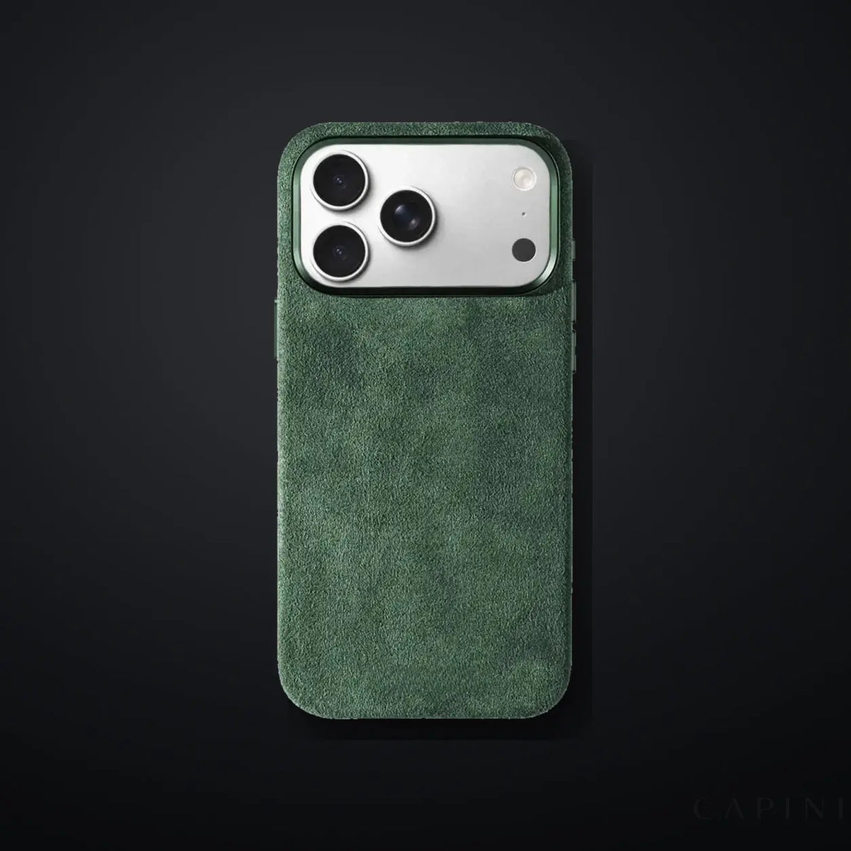 Monaco GT Green Alcantara iPhone case on a charcoal gradient | CAPINI_GRID_EDITORIAL_20260926