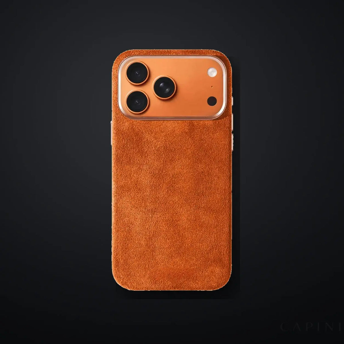 Monaco GT Orange Alcantara iPhone case on a charcoal gradient | CAPINI_GRID_EDITORIAL_20260926