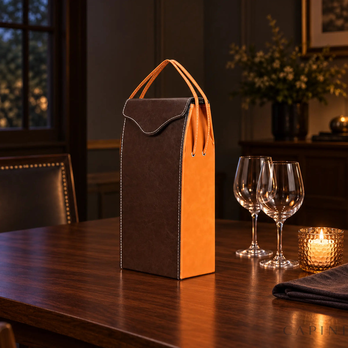 Pollenzo two-bottle wine tote on a candlelit walnut dining table