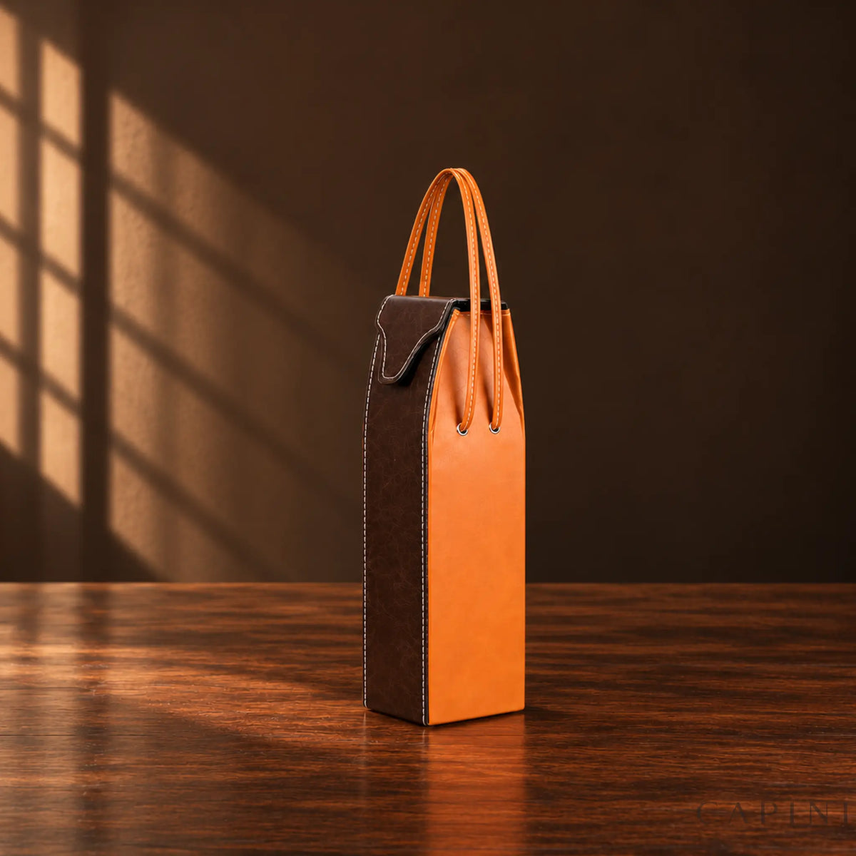 Pollenzo one-bottle wine tote with narrow rounded flap, chocolate front and caramel sides