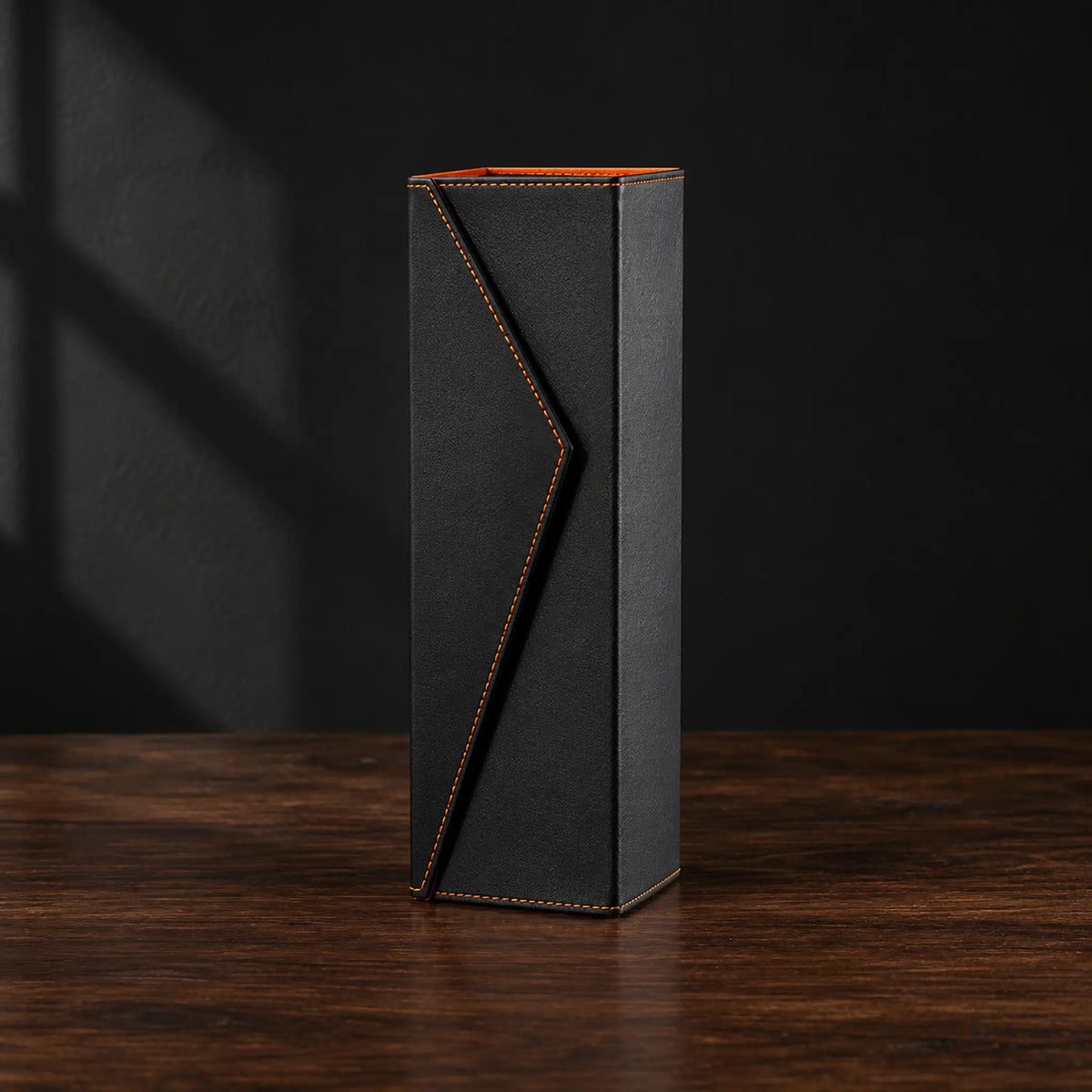 Radda Black wine gift box with stitched envelope flap on dark walnut