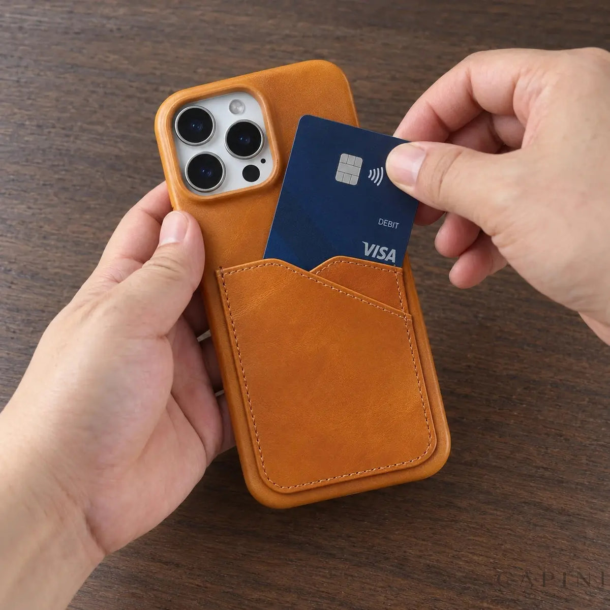 Treviso Tan card-pocket case with an illustrative debit card