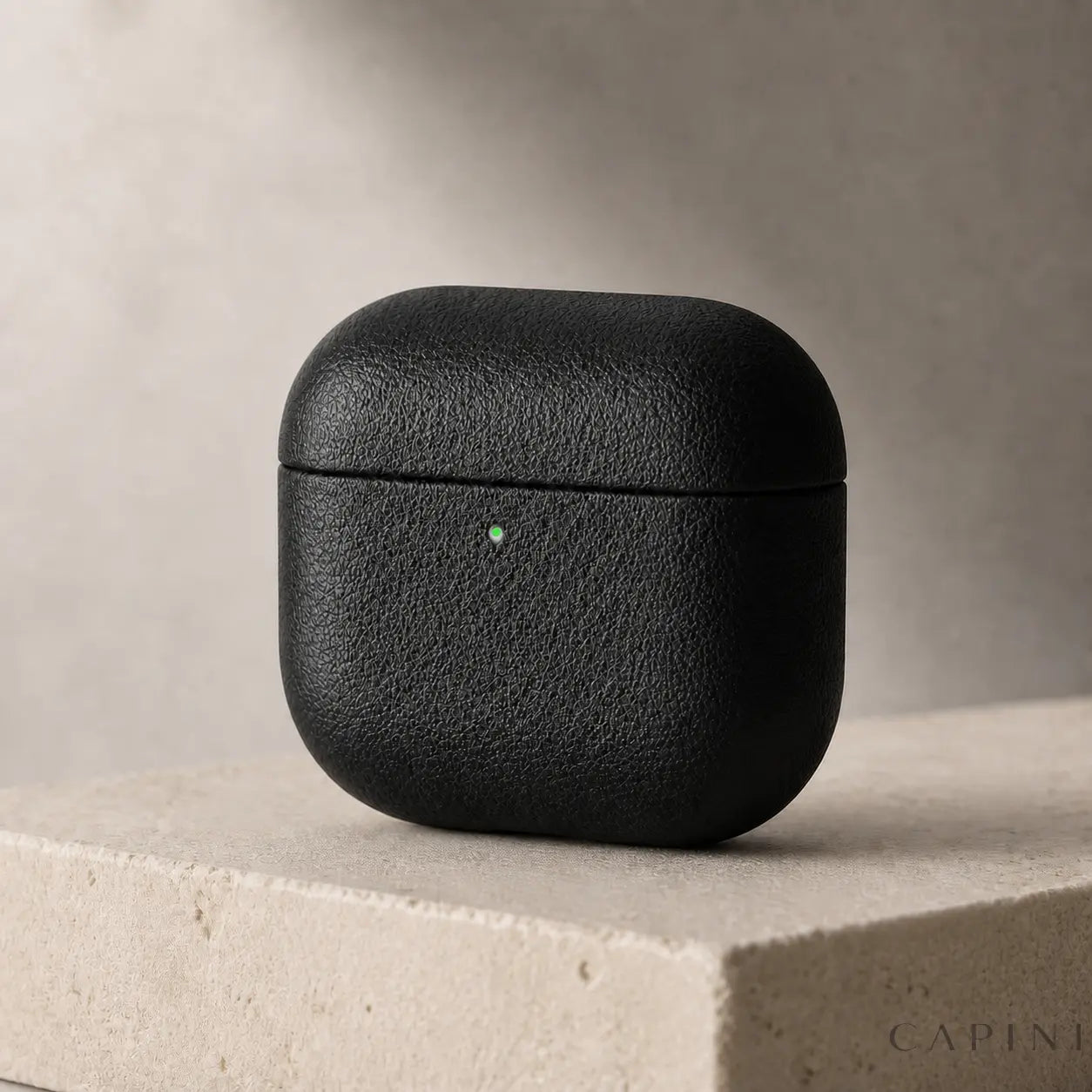 Pesaro Fine Grain black leather case for AirPods 4