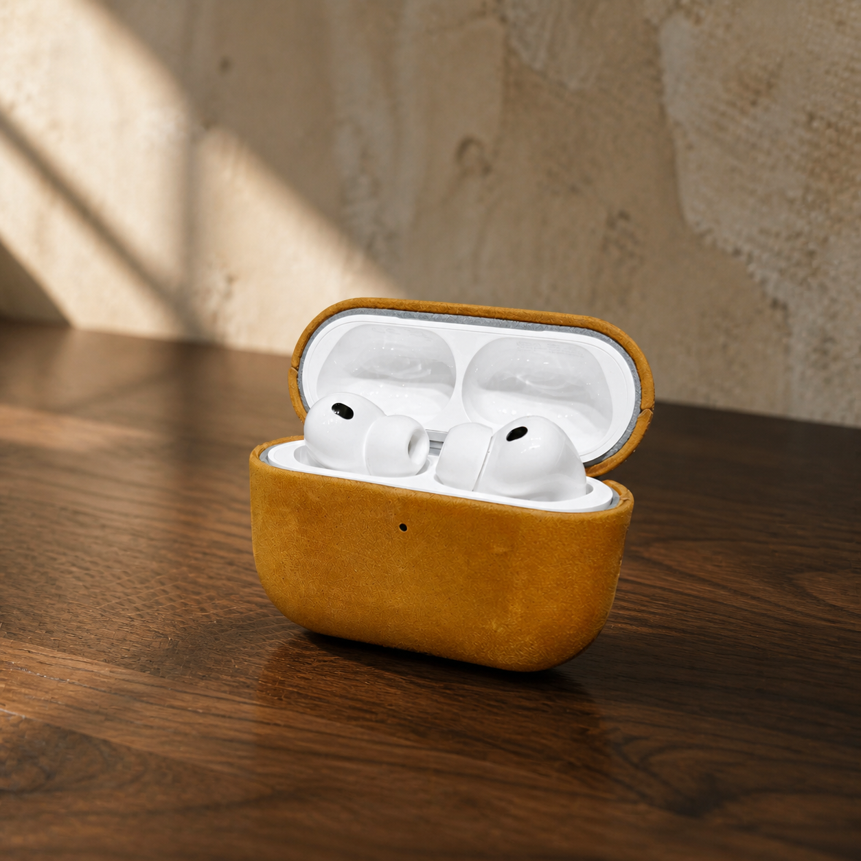 Orvieto AirPods leather case in Ochre, open front view