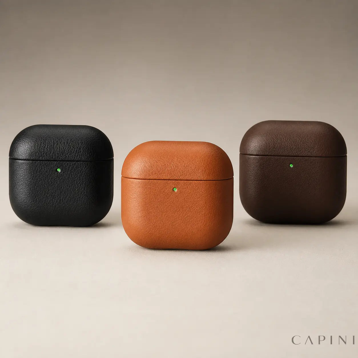Pesaro Fine Grain AirPods 4 leather cases in Black, Cognac and Espresso