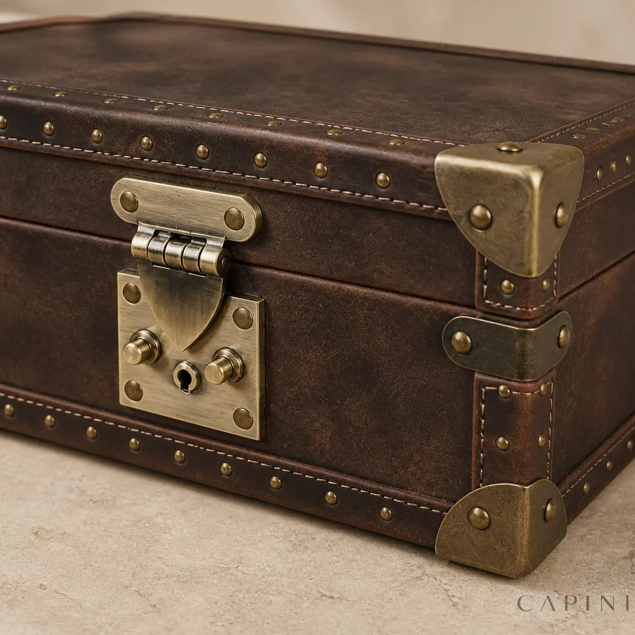 Close-up of Perugia Crazy Horse leather, brass corners and keyed S-lock