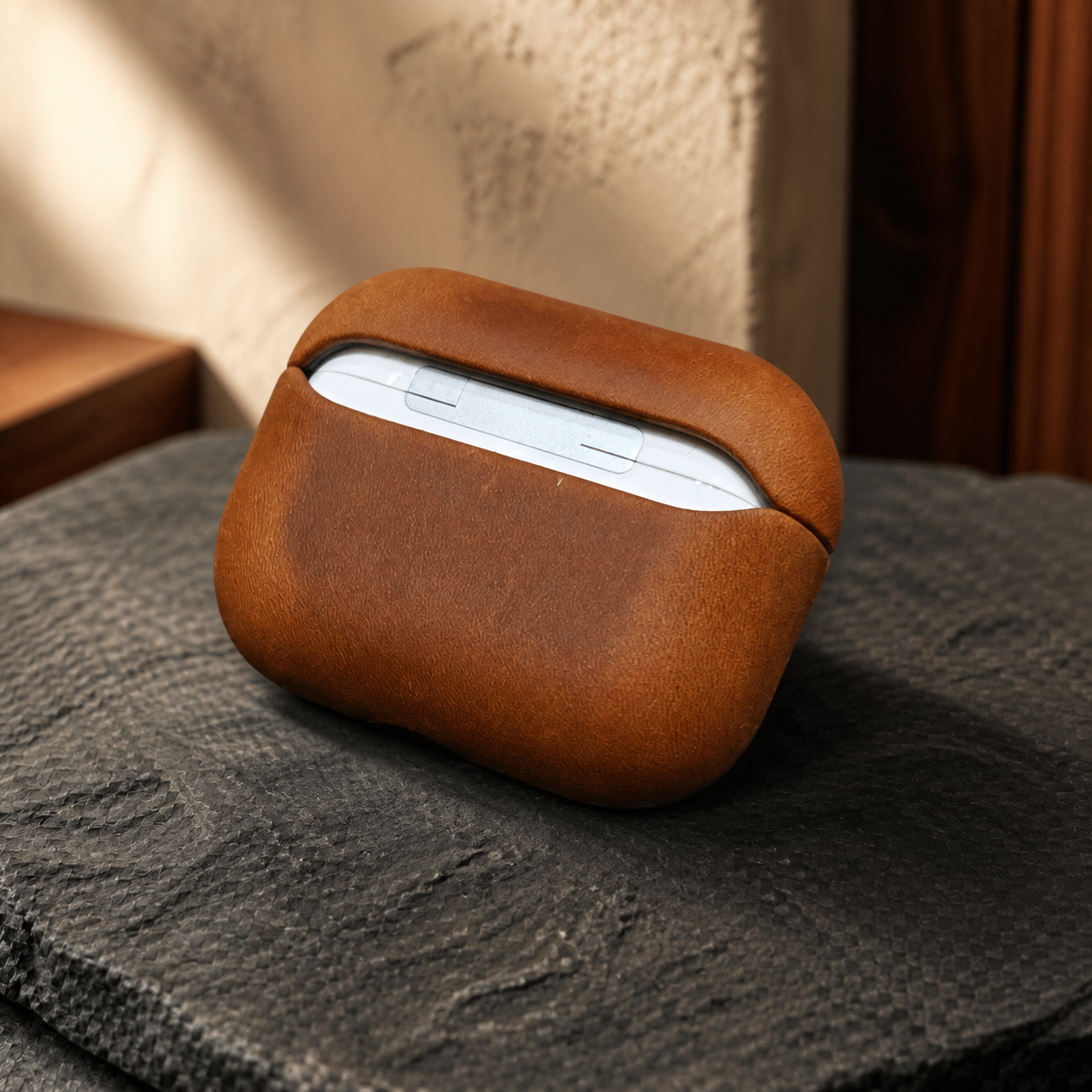 Orvieto Cocoa leather AirPods case fit detail