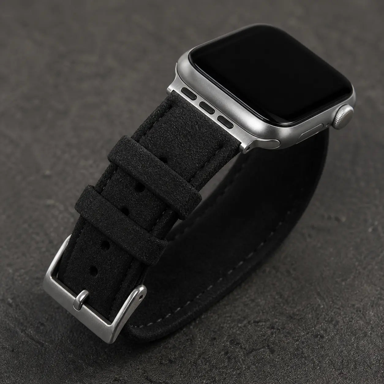 Close view of the black Monza strap texture, stitching and silver hardware
