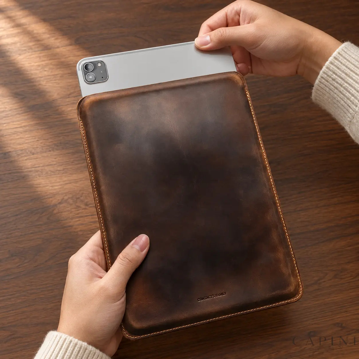 Cortona Portrait sleeve - short-edge opening in use with an iPad
