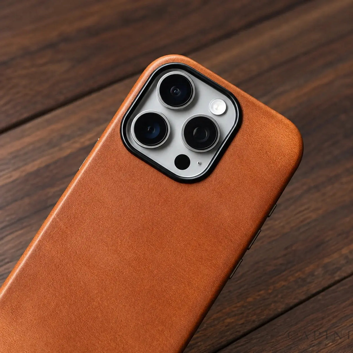 Copenhagen Cognac leather and camera rim detail — restored supplier photograph