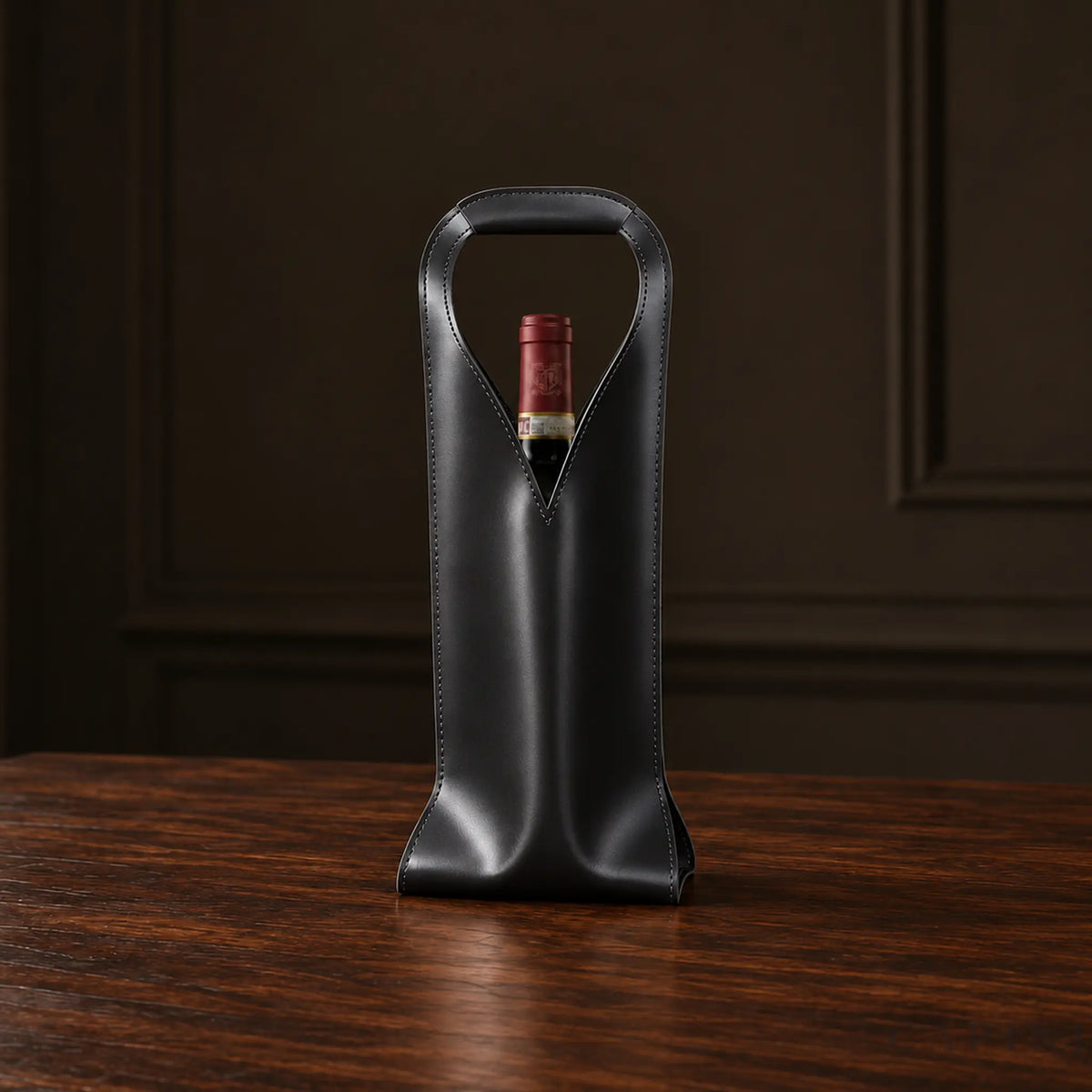 Cormons Loop Handle wine carrier in Black on dark walnut