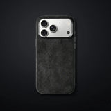 Monaco GT Black Alcantara iPhone case on a charcoal gradient | CAPINI_GRID_EDITORIAL_20260926