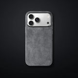 Monaco GT Pale-Grey Alcantara iPhone case on a charcoal gradient | CAPINI_GRID_EDITORIAL_20260926