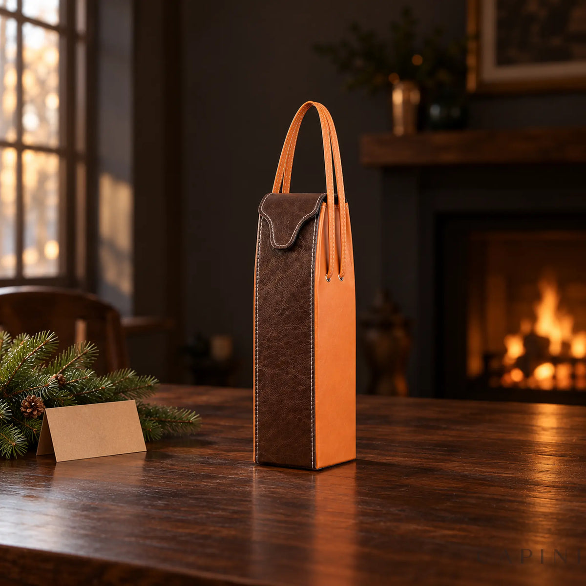 Pollenzo one-bottle tote with a blank gift card and fir sprig in a Christmas setting