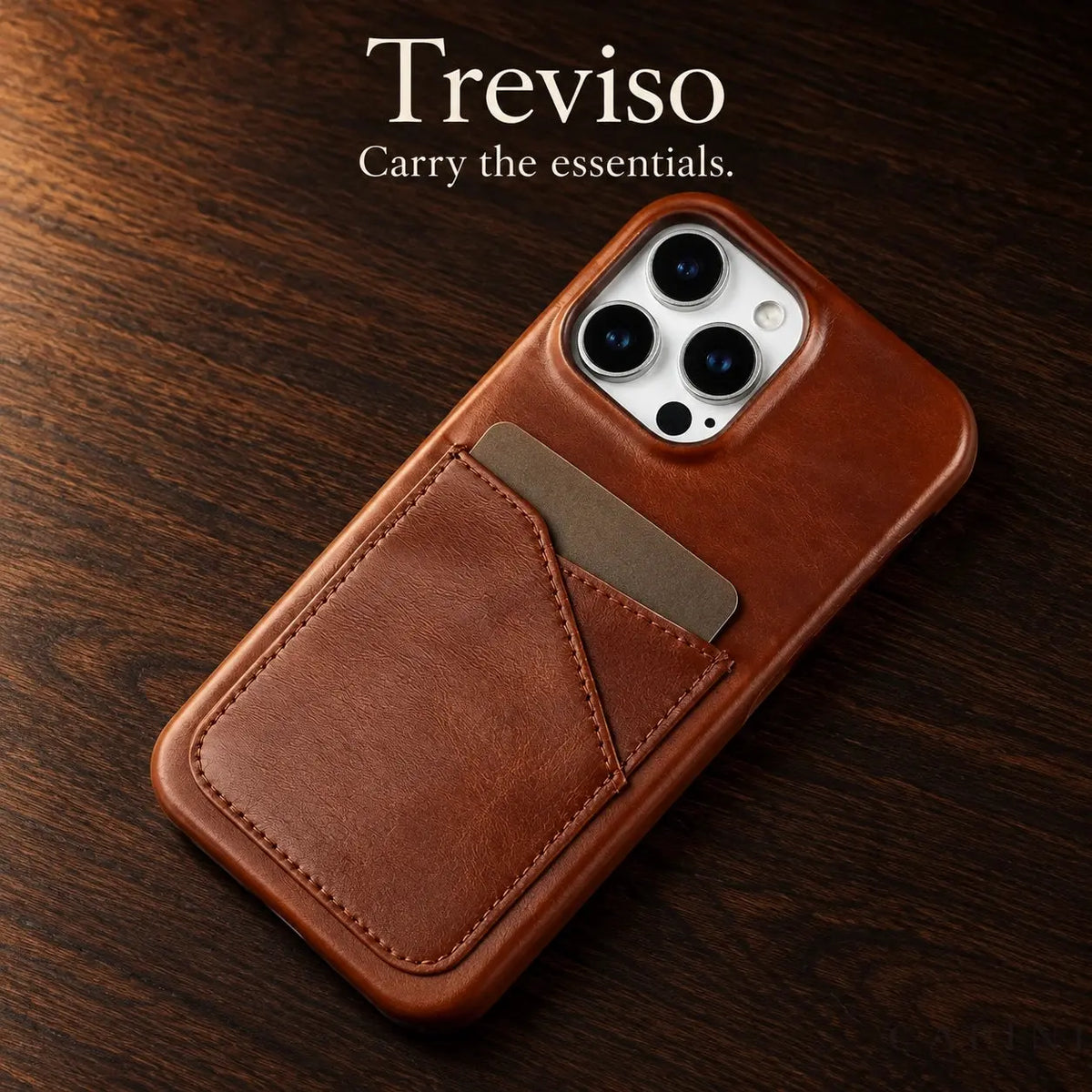 Treviso Chestnut waxed leather card-pocket case on dark walnut
